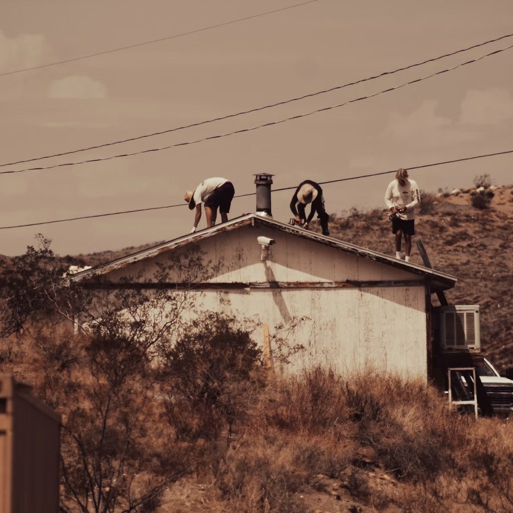 Roofing contractors working on a residential roof in La Porte, TX