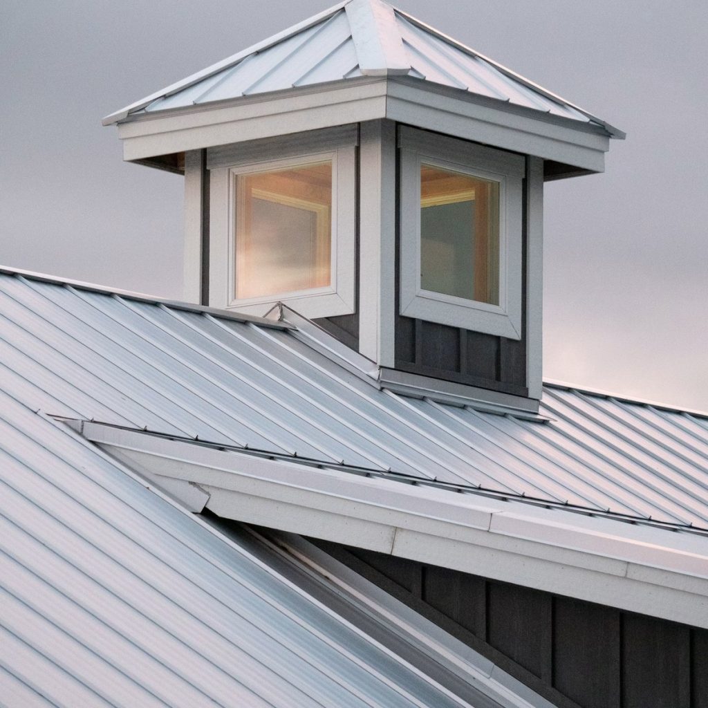 Metal residential roofing system with dormer windows in Deer Park, TX