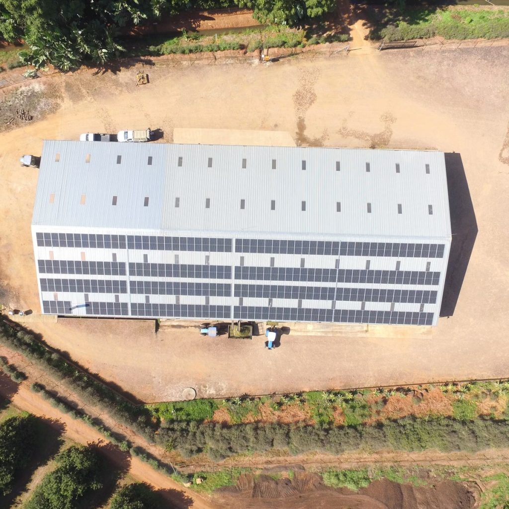 Aerial view of a large metal commercial roofing system in Highlands, TX
